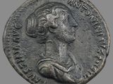 une image représentant une pièce de monnaie sur laquelle figure le profil d'une femme