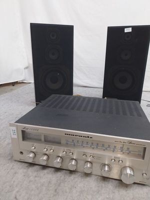 an image of a stereo system sitting on top of a carpet