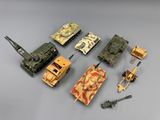 tout un tas de petits véhicules différents posés sur la table