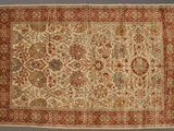 tapis persan ancien à motif floral sur fond beige