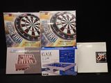 a lot of darts and other games on the table