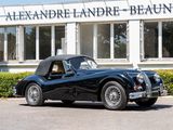 a black sports car parked in front of a building