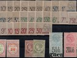 several different types of stamps on a black surface
