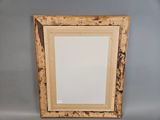 an image of a picture frame sitting on top of a table