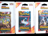 Trois paquets de cartes à collectionner Pokémon sont présentés sur un fond noir