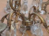 an image of a chandelier made of glass and metal