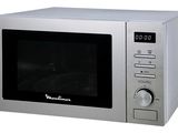 silver microwave oven on white background with electronic controls