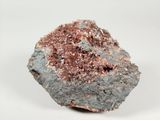 an image of a piece of rock on a white surface