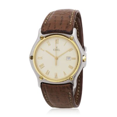 a close up of a wrist watch with roman numerals on it