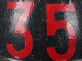 a close up of a fireman ' s helmet with the number 35 on it