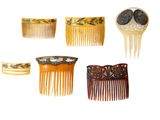 différents types de peignes à cheveux sur fond blanc