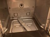 an open oven with a digital display on the door