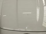 a close up of a car ' s hood with a sticker on it
