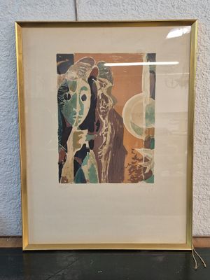 an image of a framed picture of a woman with a hat