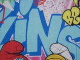 a picture of the smurfs mural on the side of a building