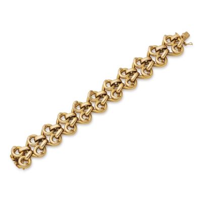 a yellow gold bracelet with a heart link