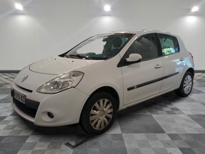 a picture of a white car parked in a garage