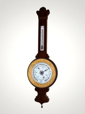 a clock that is hanging on the wall in the room
