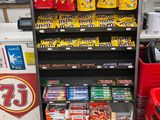 a display of candy and candy bars in a store