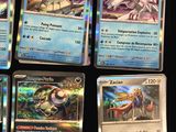 a lot of cards that are on the table