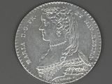 an old silver coin with a portrait of a woman on it