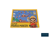 une photo d'un jeu « Nintendo Super Mario Maker » posé sur la table
