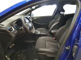 the interior of a blue car with black seats and a steering wheel