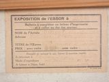 a sign on the wall that says exposition de lessor a