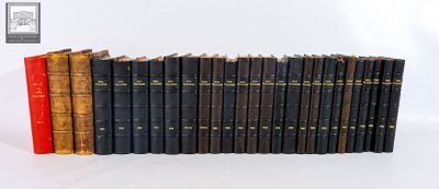 a lot of books that are lined up in a row