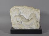 marble sculpture of a woman reclining on a rock on a marble base