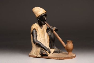 Fumeur de pipe africain Statuette en terre cuite, signée Jea…