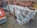 a pile of pipes and pipes sitting on the ground