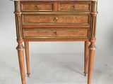 an image of a marble top chest of drawers on a stand