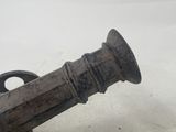 an old cannon that is sitting on the ground