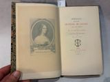 someone is holding a book with a picture of a woman on it