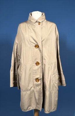 an image of a beige coat on a mannequin mannequin mannequin mannequin mannequin mannequin mannequin mannequin