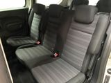 two seats in the back of a car that are empty