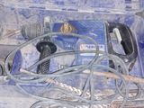 a blue tool box with tools in it on the floor