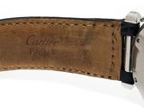 the watch is made of stainless steel and has a brown leather strap