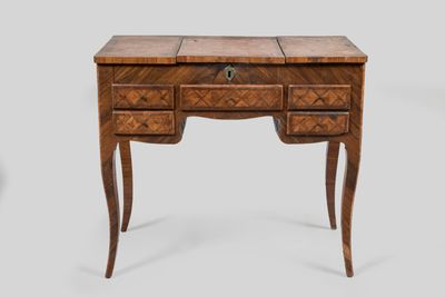 a wooden desk with drawers and a drawer on top of it