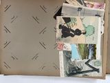 a picture of a box with a bunch of postcards inside of it