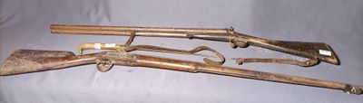 these are some old guns that are on a white cloth