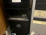 two computers sitting next to each other on the floor