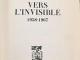 an open book with a black and white image of the title of the book