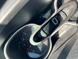 a close up of a car ' s dashboard with a speedometer
