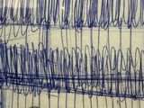 a drawing of a clock on a piece of paper