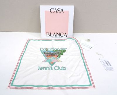 a white table cloth with a picture of a tennis player on it