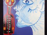 un tableau représentant un homme avec une guitare posée sur une table