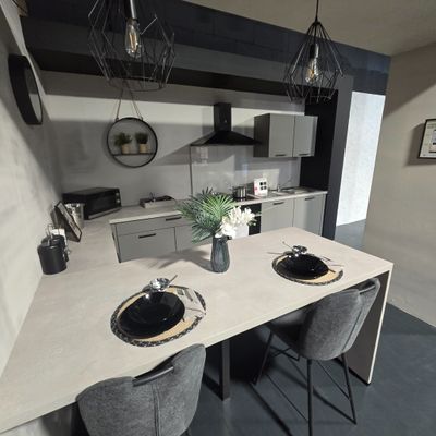 two chairs at the table in this modern kitchen