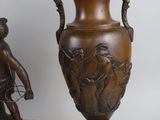 pair of antique bronze vases on marble bases with winged handles